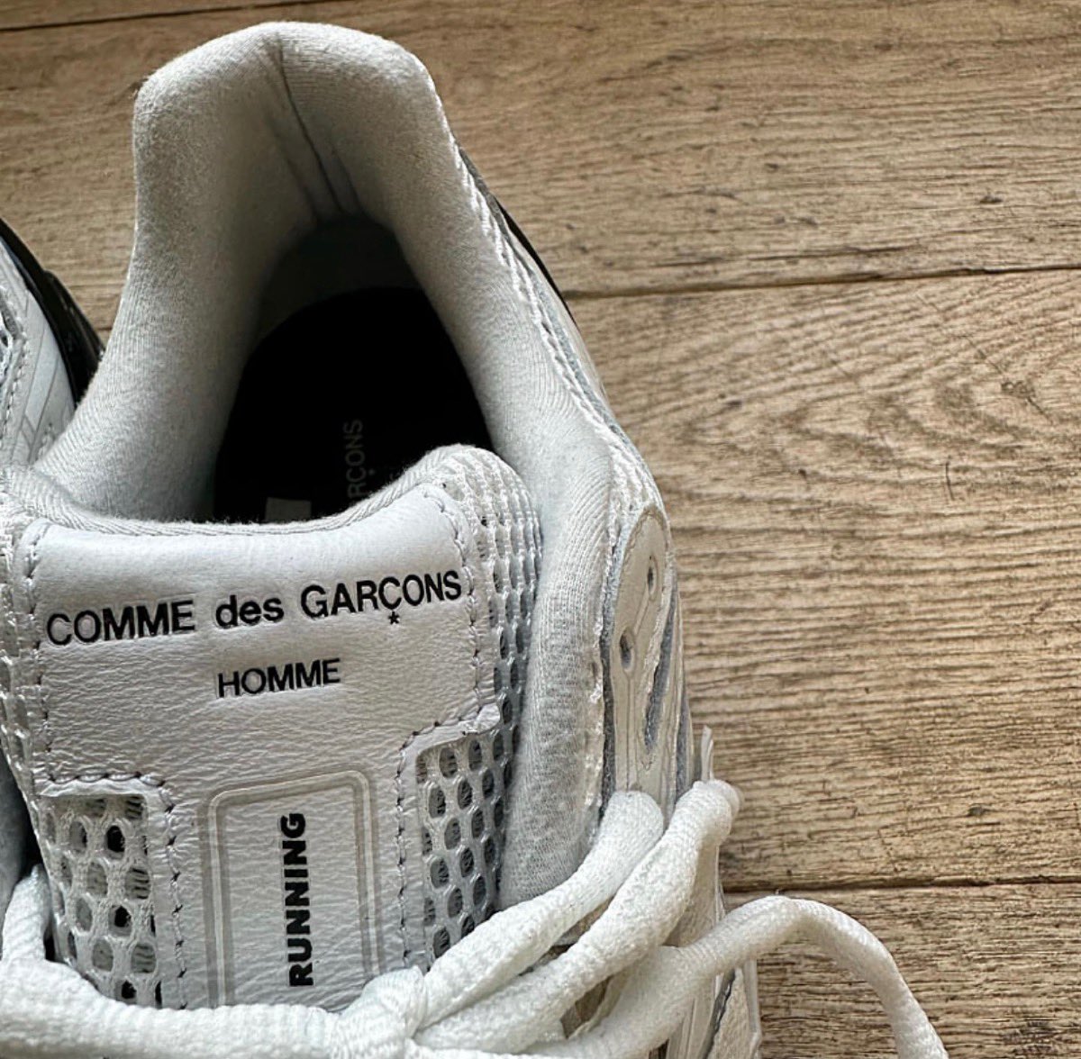 COMME des GARÇONS HOMME × New Balance 1906R by Junya Watanabe (FW23)
