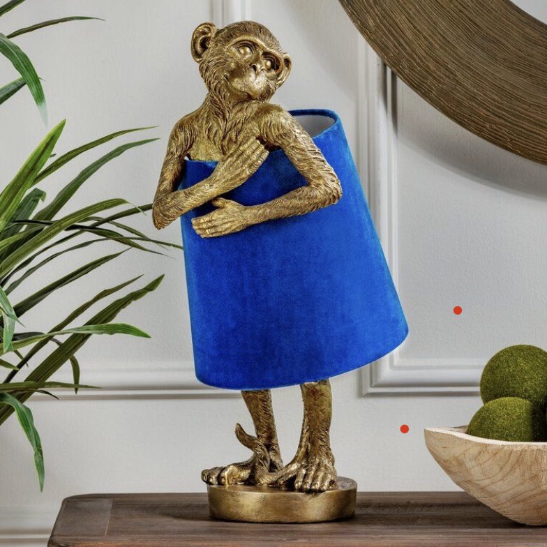 an artistic homage to enthusiastic consent between a monkey and a lonely lamp designer