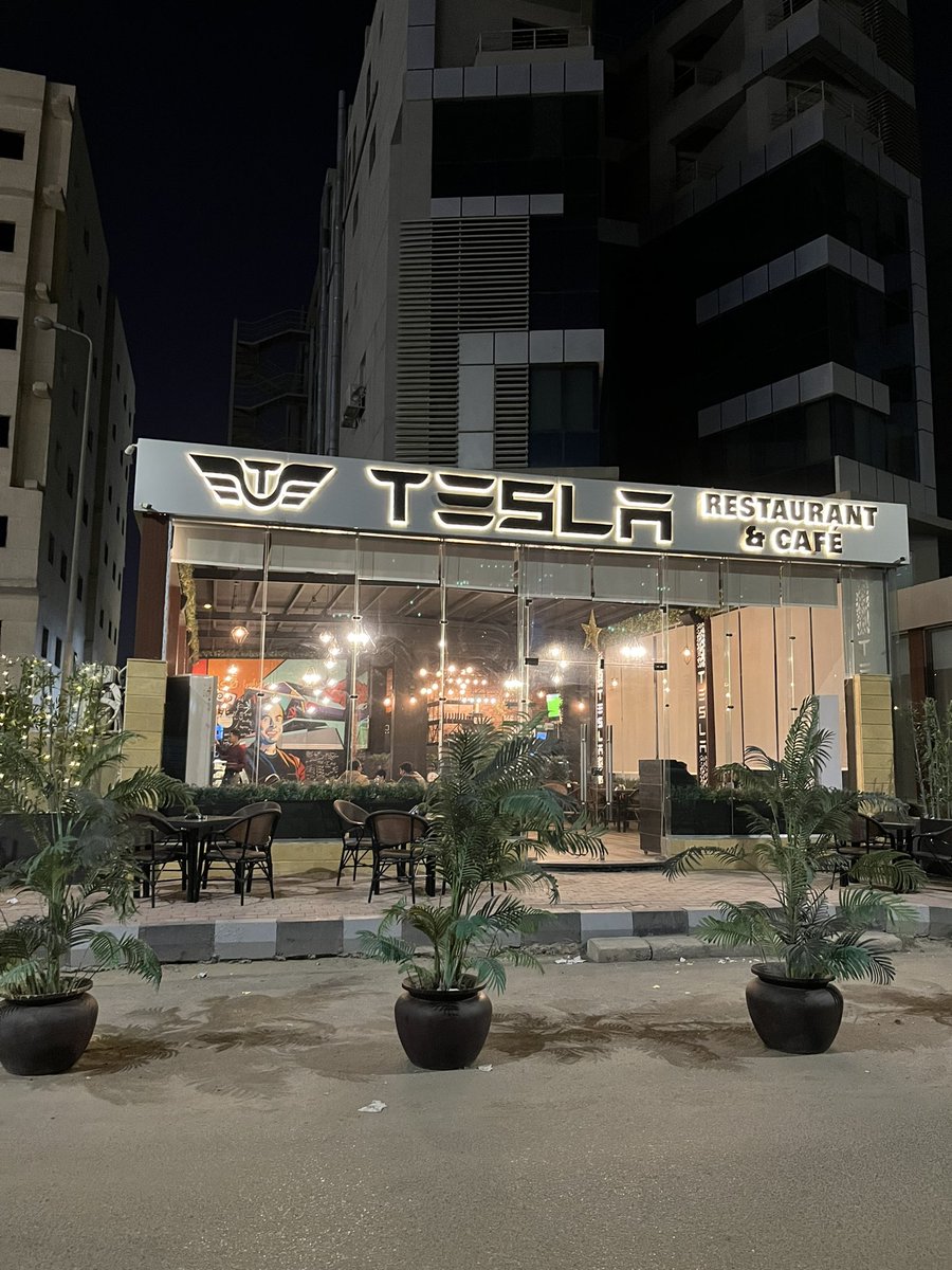 Xtremee's tweet photo. Only in Egypt, @Tesla is a restaurant &amp; cafe with a painted face of @elonmusk #TESLA #ElonMusk https://t.co/0JlWdpkvmU