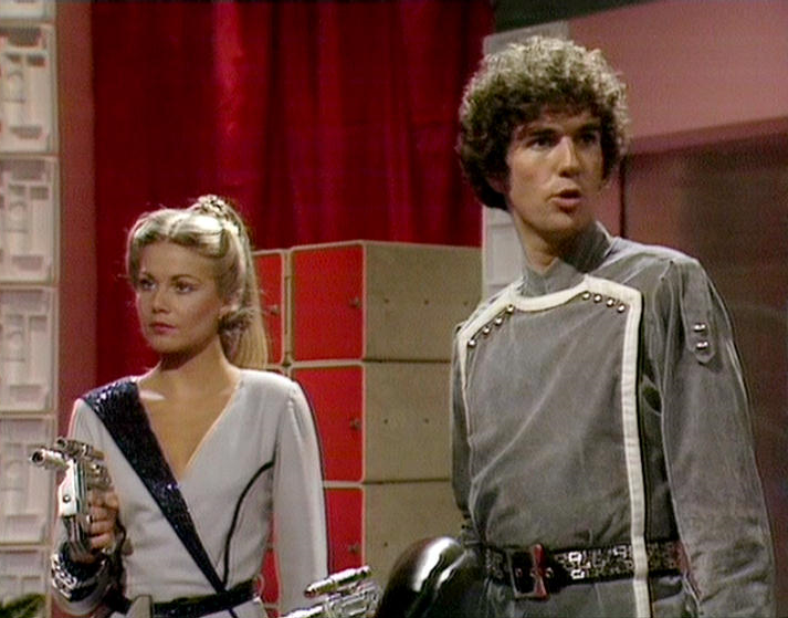 Blake's 7 Series D, Episode 10 - Gold

KEILLER:  This is the Space Princess. A bit of a played-out old pleasure cruiser. This is the Pursers Office of the Space Princess, and this [Indicating himself.] is the Purser of the Space Princess. Are you with me so... [1/2]