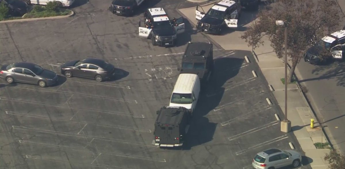 Sky5 view of a white van that police have surrounded in Torrance in the area of Sepulveda and Hawthorne. Watch Live: ktla.com/news/californi…
