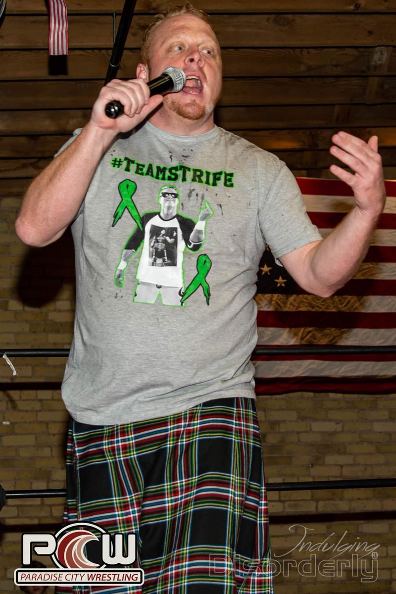 TheeAaronCorbin's tweet photo. I will keep bringing Strife with me to shows as long as I can! #teamstrife #wrestling https://t.co/sEMJTS77Nf