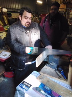 Moin and the group were putting their woodworking skills to the test by sawing up wood for Enterprise. The group followed instructions and showed great sawing skills, well done team!'