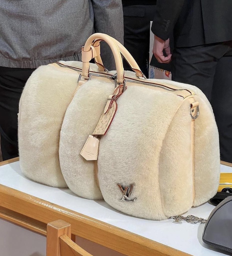 ✭ on X: dying for this duffle louis vuitton bag by kidsuper   / X