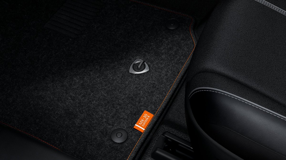 Mazda_Europe's tweet image. The #Mazda #MX30REV Edition R includes stylish details to give owners a sense of pride in owning a vehicle equipped with a #rotaryengine thanks to exclusive details, such as; subtle orange highlights in the interior and a multi-tone exterior with Maroon Rouge on the framed top.