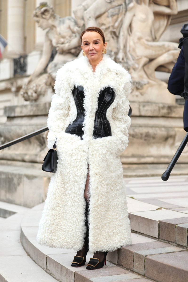 saintdoII's tweet photo. the real star of emily in paris attending schiaparelli ss23 https://t.co/veRMZ5stRa