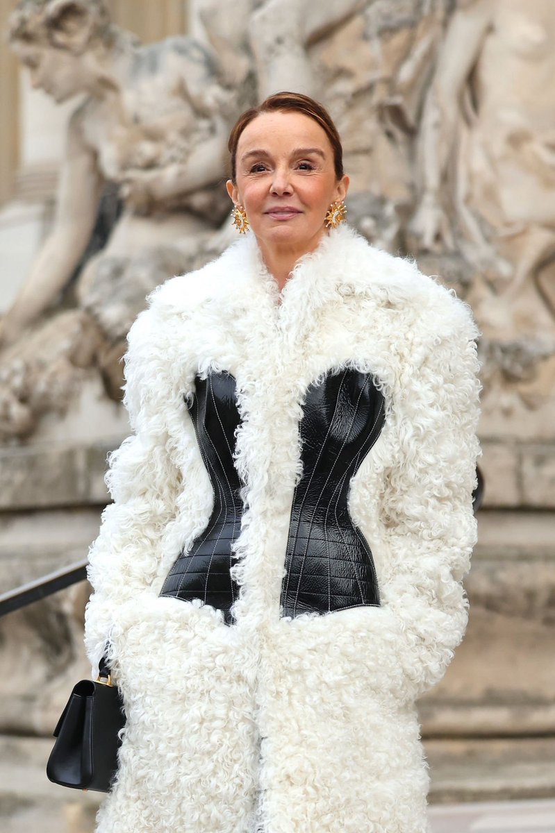 saintdoII's tweet photo. the real star of emily in paris attending schiaparelli ss23 https://t.co/veRMZ5stRa