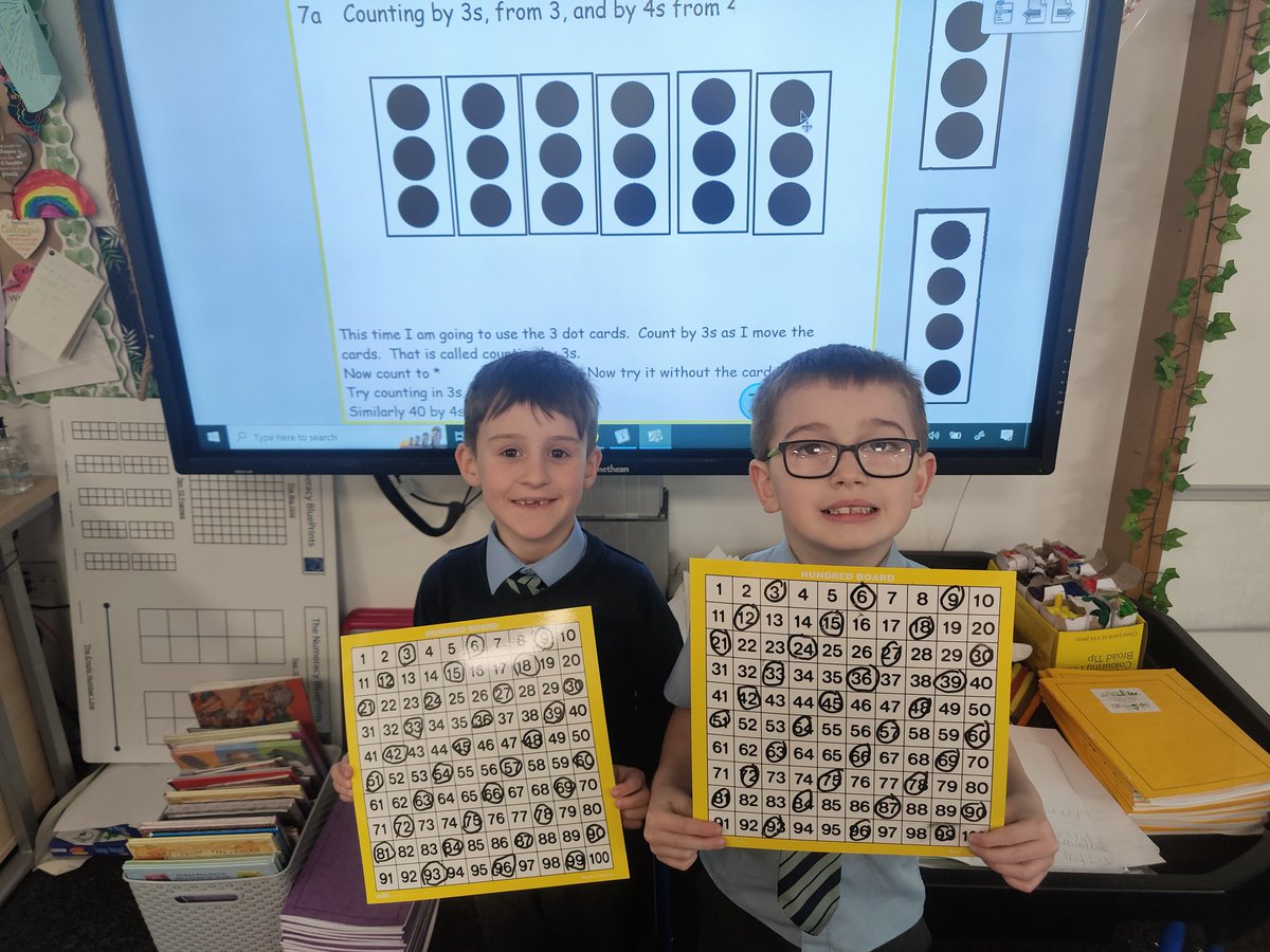 MrsDorrianStN's tweet photo. Look at these two superstars! They aced "Counting in 3s" and were able to see the pattern forming on their 100 square. "It's making diagonal lines" well done F and L! 🌟 #MathsIsMagic @StPatricksPS15 https://t.co/d13bzWo23V