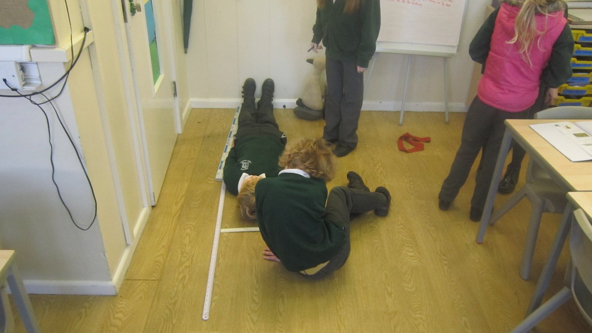 CFS_Falcons's tweet photo. A lovely bit of practical Maths today in #Year3. To kick off our new topic of Length, the class took it in turns to measure each others! No one got near Mr Hynam's 188cm though 😉 #MetresAndCentimetres #PracticalsMaths https://t.co/LeZSCRd7f0