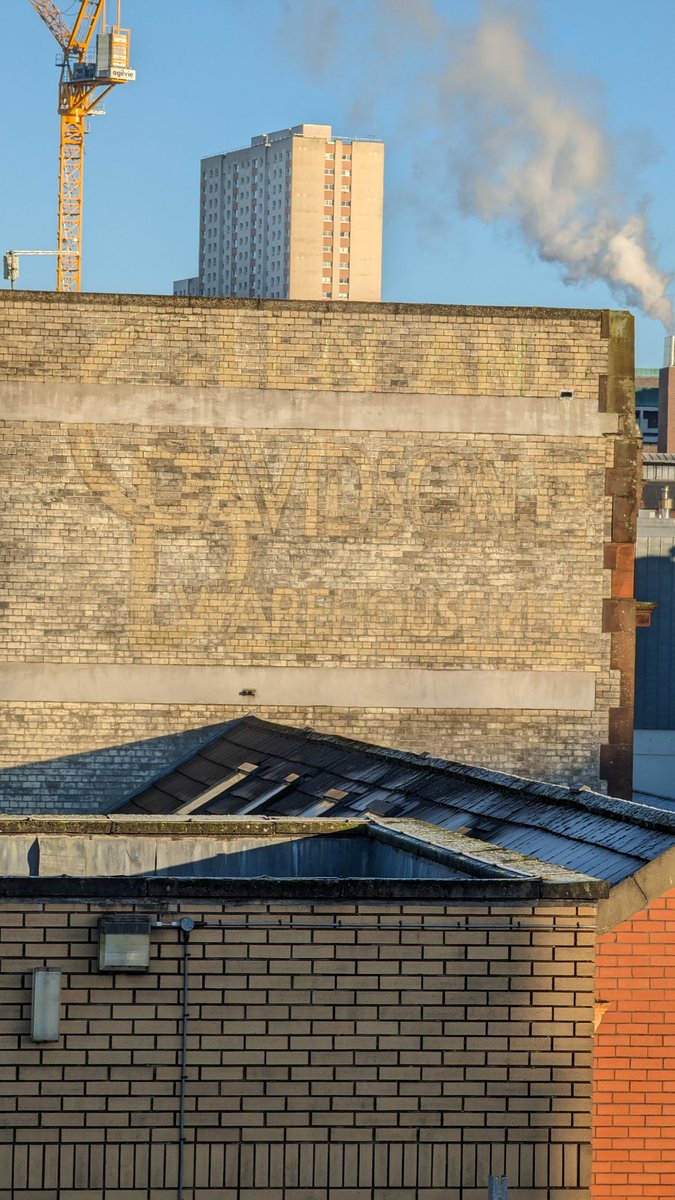 Ghost sign on the sign of a building in Glasgow