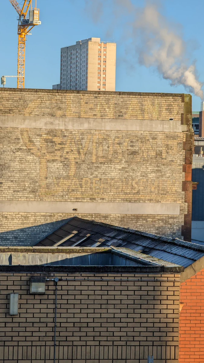 Ghost sign on the sign of a building in Glasgow 