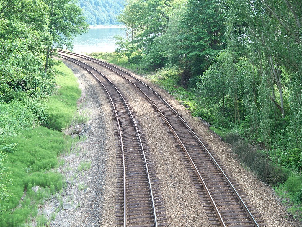rrscenery's tweet photo. Once you are satisfied with your model railroad track arrangement, you can start gluing down roadbed, working on one section at a time.  https://t.co/HLVXbwRH10 https://t.co/EUJAxSyqyD