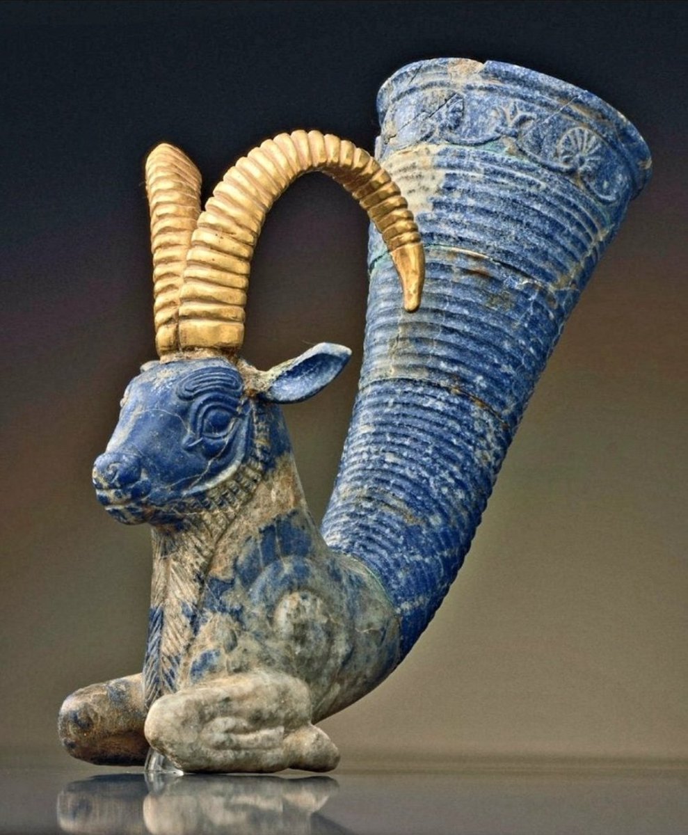 Persian Achaemenid rhyton (drinking vessel or vessel for pouring libations) made of lapis lazuli and gold. 6th-5th century BCE. Photo source: irangashttour.com