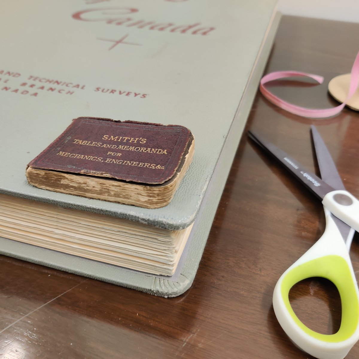 IngeniumCa's tweet photo. To start #MuseumLibraryWeek 2023, here is our smallest and our oldest book from our rare book collection. If you look closely at the second, you’ll see wormholes in the corners of the page. How does the library conserve old book like these? Follow us to find out on Wednesday! https://t.co/NCPAGQ0ZUn