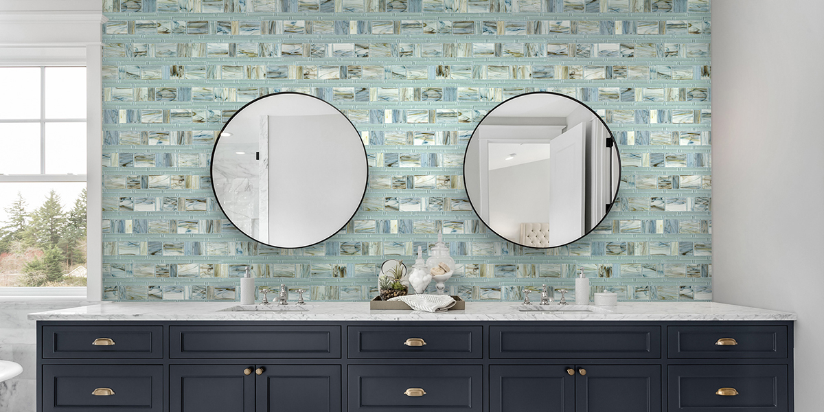 The Glassique collection creates the image of semi-precious gemstones with colors that create highlights and give focal points to any project. #katelotile #glasstile #mosaictiles #BathroomMosaic #backsplash #interiordesign