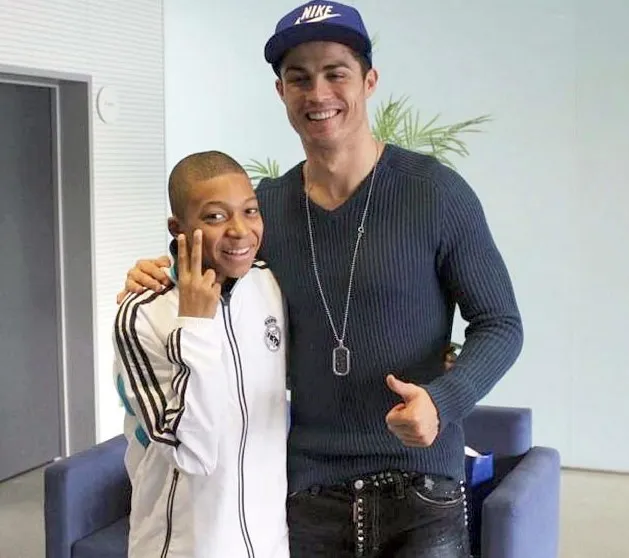 timiretimzzy2's tweet photo. I'm starting to think Mbappe is a Compound V project 'cause how did he have this much access as a kid? https://t.co/E17rhLQ3SA