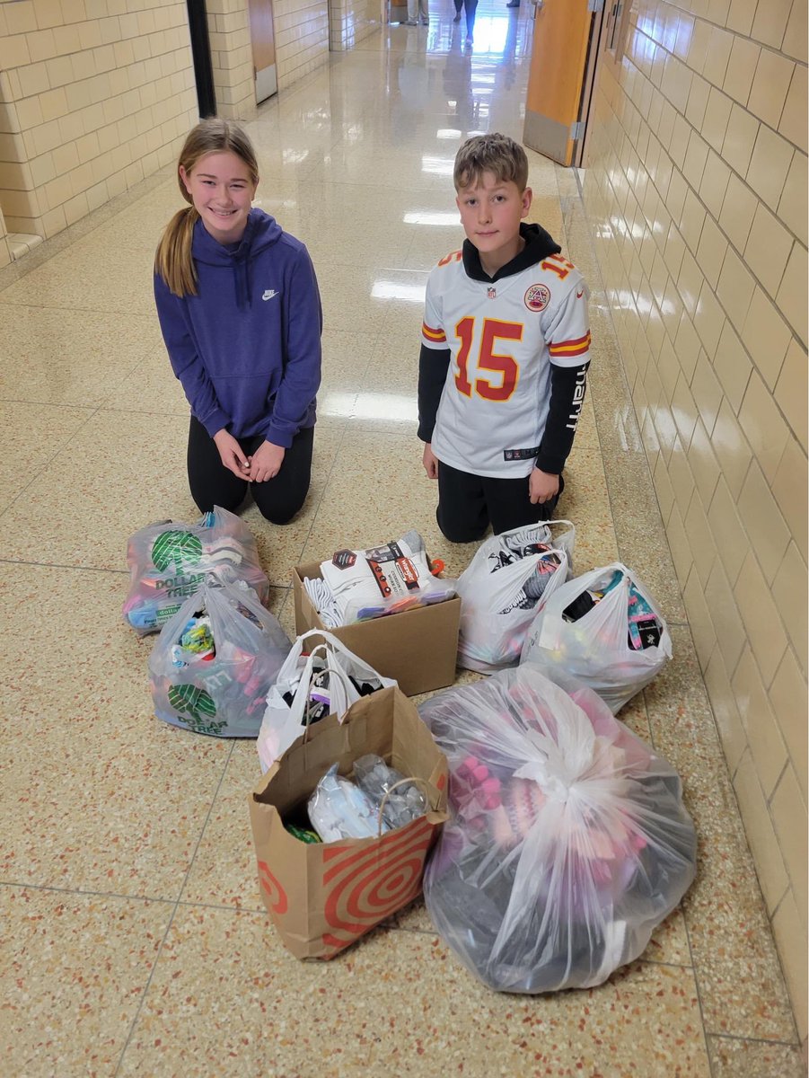 Throughout the month of December, the Jr High Student Council held a sock and mitten drive. Overall, they raised 466 pairs!! Pictured are two of the student council reps with the socks/mittens! <a href="/kwpublicschools/">K-W Public Schools</a> <a href="/KWPrincipalRyan/">KW 7-12</a>