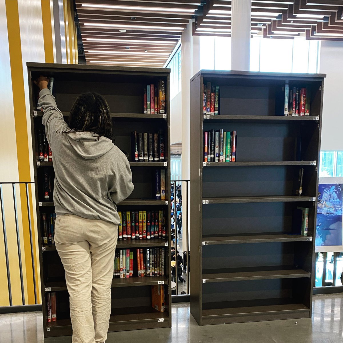 MaggieMoo86's tweet image. Yessssssss! Today I had my first groups of students check out new books from their new library space. We are in infant stages of course, but wherever you put out good books for free choice, they will come!!! #TigersRead #LibrariesforEveryone @HISDLibraryServ @SHMSTC
