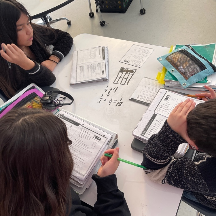HRE_lion_cubs's tweet photo. Our 5th grade students are collaborating and using their synergy to successfully divide fractions! #lioncubsleadtheway🖤💛 #leaderinmeHRE https://t.co/q6Bw73qRLh