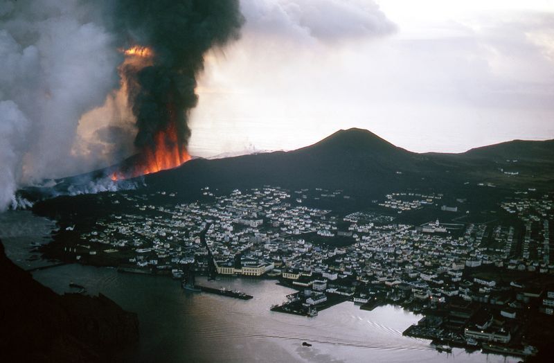 Today are 50 years since a volcanic eruption began in Iceland that destroyed 1/3 of houses in the Westman Islands. Many people whose houses were destroyed moved away permanently. Together with <a href="/JonSteinsson/">Jon Steinsson</a>  and Emi, we studied the consequences of this. academic.oup.com/restud/article…