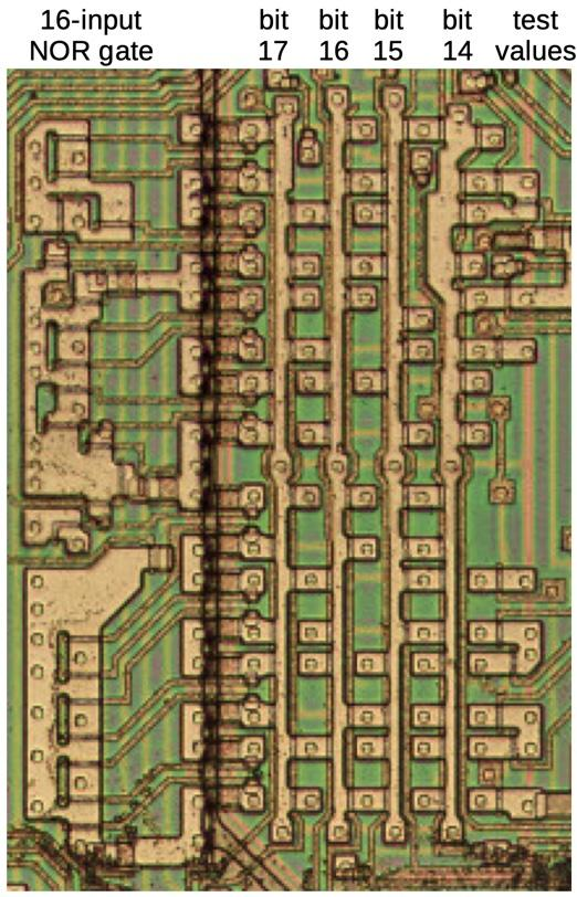 A closeup of a grid-like programmable logic array on the die.