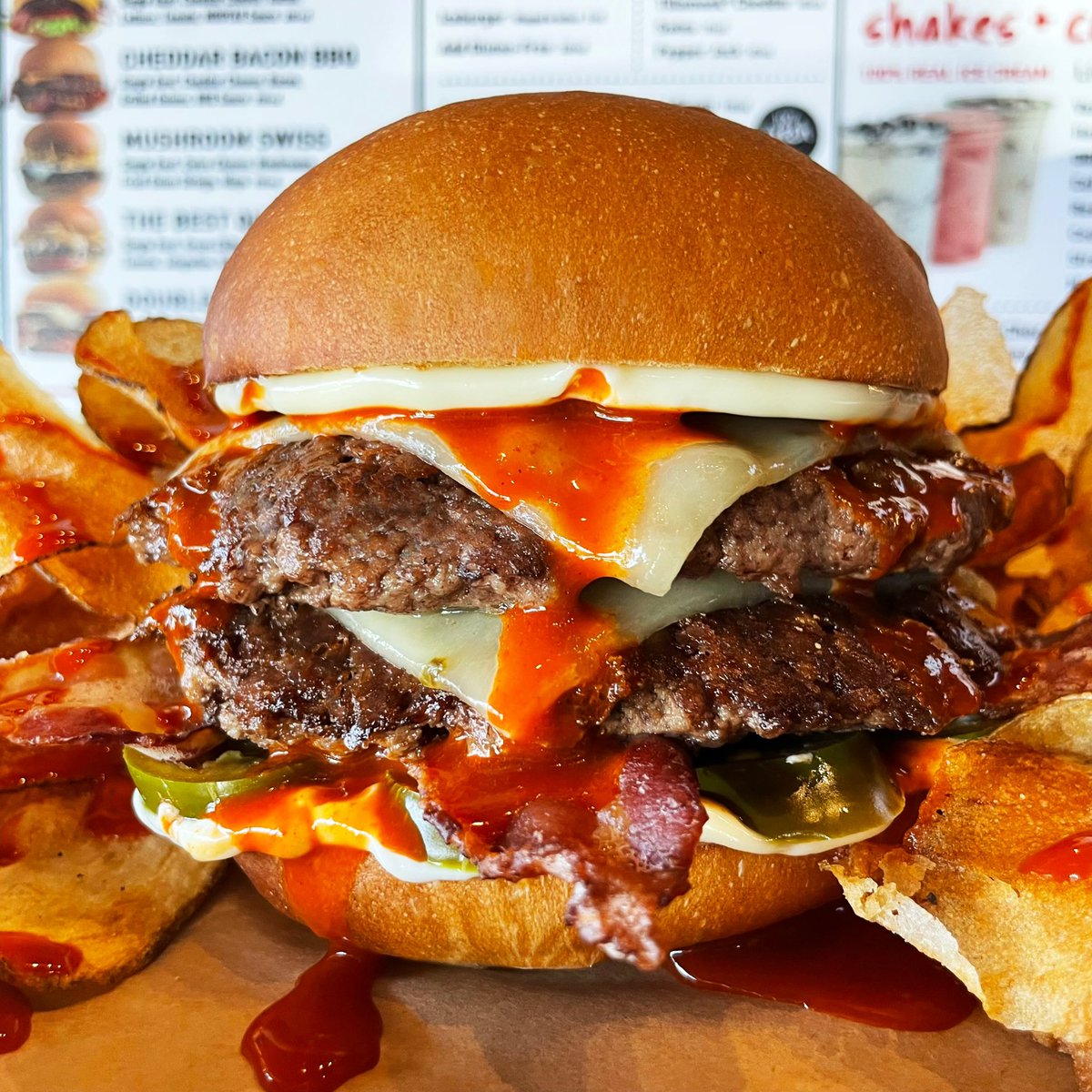 MooyahOC's tweet photo. #HotSauce drippin’. I’m #cominginhot! 🌶️🩸🔥🍔 #MOOYAH #Ridiculicious #nationalhotsauceday #hotsauceday #cholulahotsauce #cholula #spicyburger #doublediablo #favoriteburger #bestburger #somelikeithot #keepitspicy #irvine #oceats https://t.co/aNJp3NV1Tf https://t.co/xNdAkNL3mH
