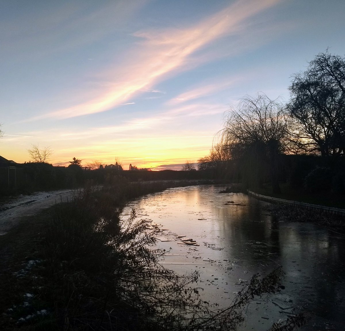 Working from home today. Trying to keep up a daily walk and love getting out at twilight at this time of year. Sunset over the frozen canal at Knoll Street Market Harborough, near where we live.