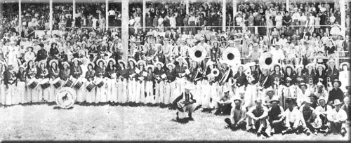 The historic Cowboy Band is seen here in a group pose at the 25th Annual Black Hills Roundup in 1943. When you attend the Black Hills Roundup, you can still have the rare experience of hearing a live cowboy band performing at a rodeo event. 

Tickets: BlackHillsRoundup.com