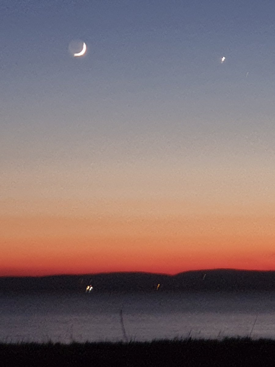 Tonight at dusk - Poole Bay. New Moon with reflected light 'earthshine' illuminating the unlit portion of the Moon; plus Venus of course!