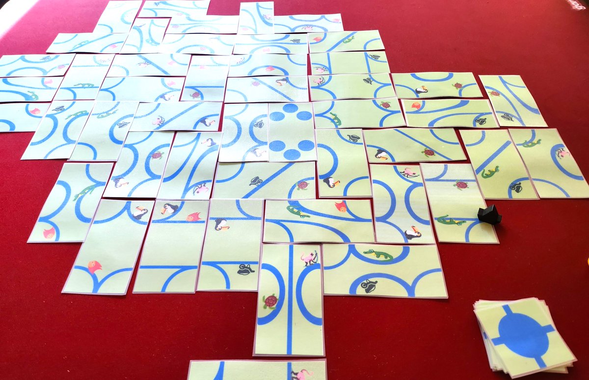 EllieDixTweets's tweet photo. I've been working on a new game called Lagoon Safari. It's a bit like Tsuro and a bit like Bandido, but more complex than both because of the branches which create multiple routes. Aim is to pass wildlife to score from objectives. I've doubled the wildlife to get more interaction https://t.co/lRD4Bby2Z8
