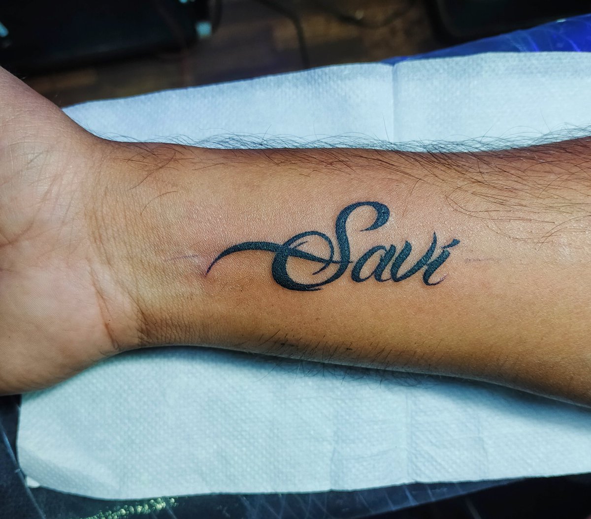 Name tattoo on interior forearm Black Leaf Tattoo Studio Jhaiho