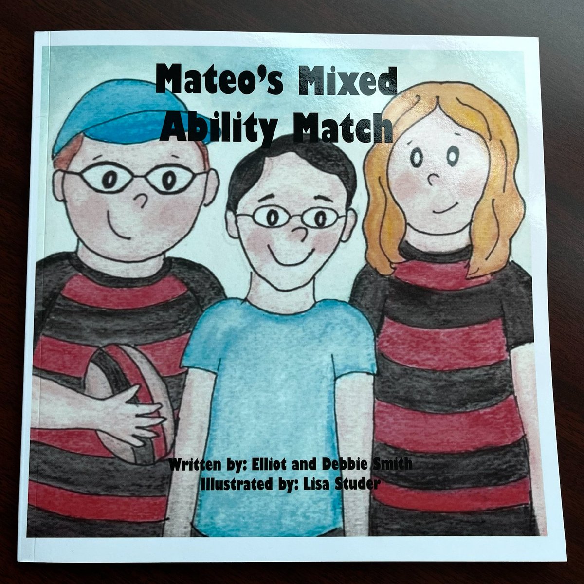 Ajax Council recognized the Oshawa Vikings last night for their silver medal finish at the International Mixed Ability Rugby Tournament in Ireland. Team co-captain and Ajax resident Elliot Smith sent me a copy of his book “Mateo’s Mixed Ability Match.”