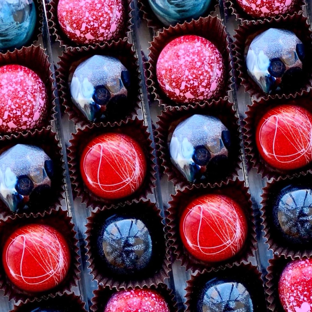 Almost too pretty to eat. 🍫  Join our pastry chef Jason Reaves in the Cooking Studio on February 11 and learn the secret to making bonbons. #Bonbons