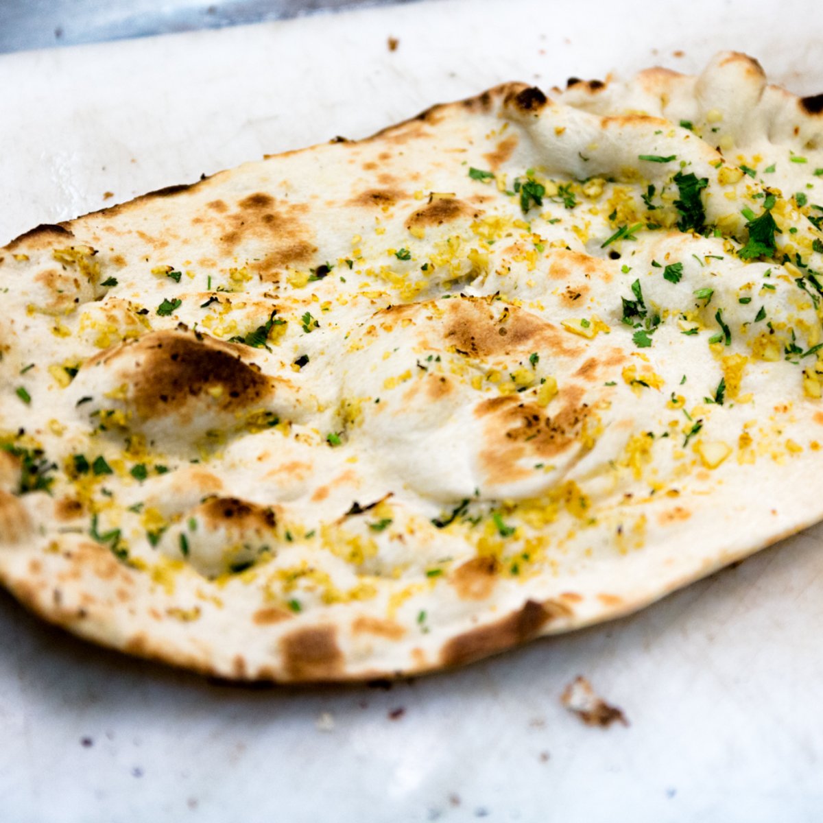 IndiasDenver's tweet photo. Naan goes perfectly with curry. If you're going to enjoy some of our curry and rice, you have to pair it with our garlic naan. #IndiasRestaurantDenver https://t.co/0mUmEBGFre