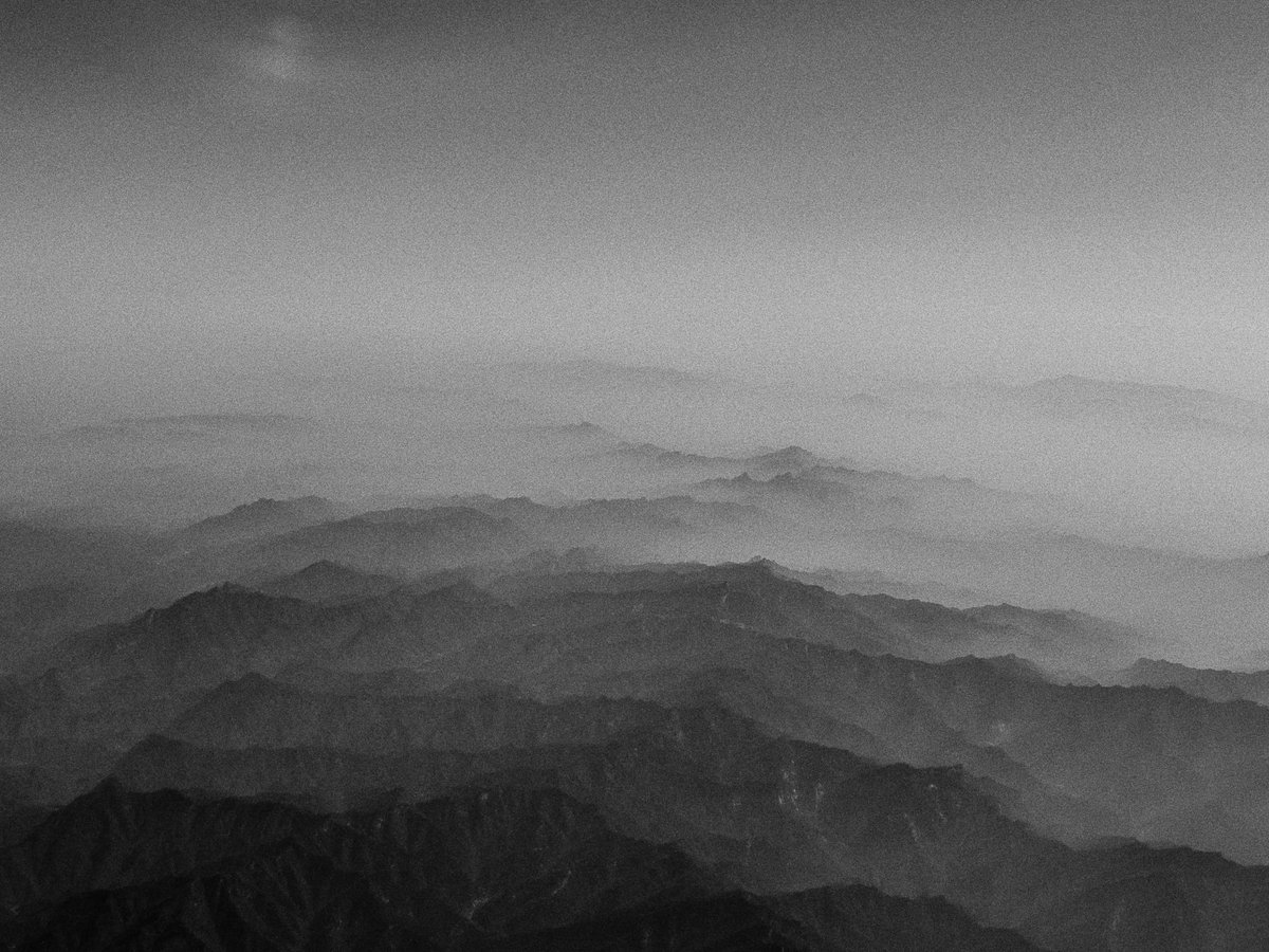 'Beyond the Fog' Just dropped the 4th artwork of the 'Lost in Time' set. I took this picture when I was flying in a small aircraft over the Chinese mountains at least 10 years ago... 🪙Reserve price : 0.25 Ξ 👇🏽 More details