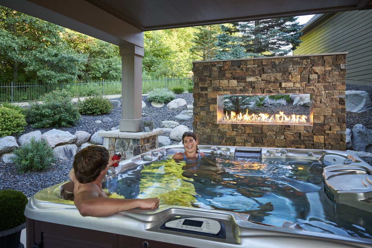 Set yourself up for the best summer ever. ow.ly/NtS550Mzcv6 #bringhomeoutside #outdoorfireplace #backyardinspo #hottub #summernights