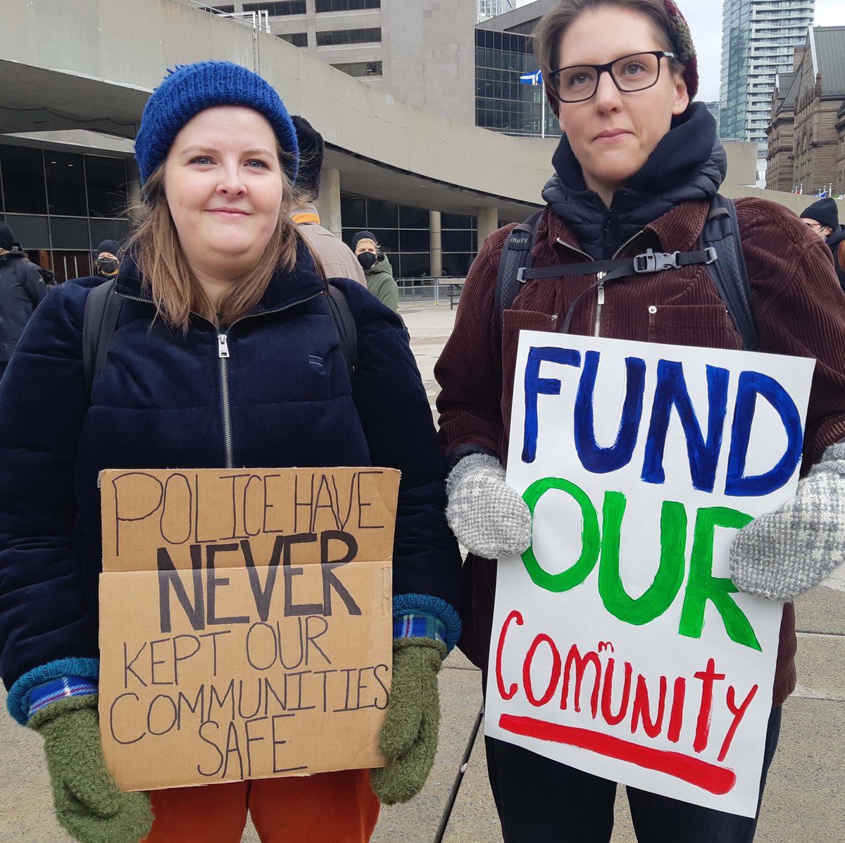 socialist_ca's tweet photo. Toronto rally to defund the police. Mayor Tory is planning to increase the police budget by $50 million while cutting everything from libraries to transit to housing. 
Cops don’t keep people safe - community support does.

#DefundThePolice #toronto #CommunityNotCops #CareNotCops https://t.co/LwbJjr3IJ1