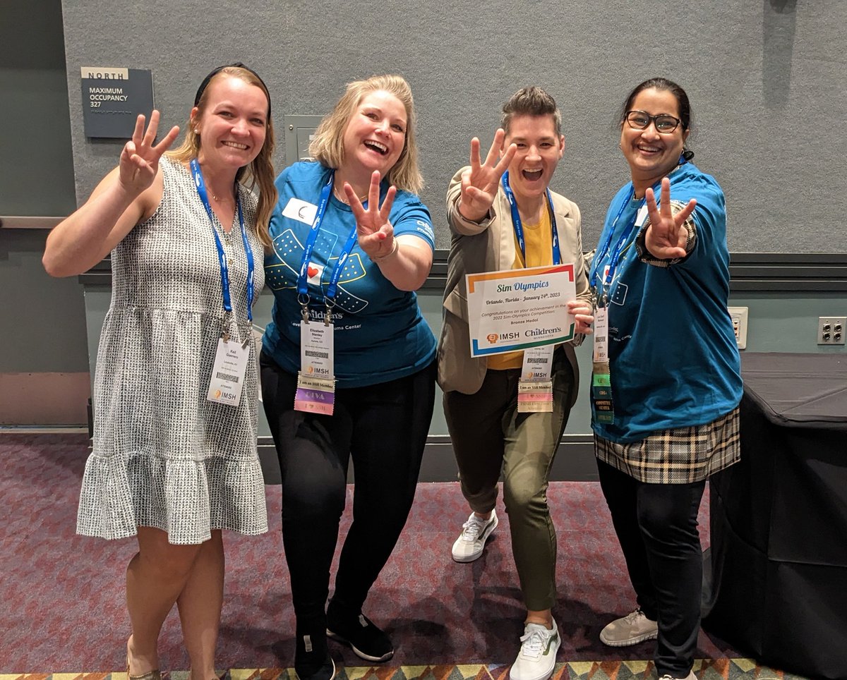 Team C holding the Bronze medal certificate after participating in the Sim Olympics Competition #IMSH2023 #SSHorg