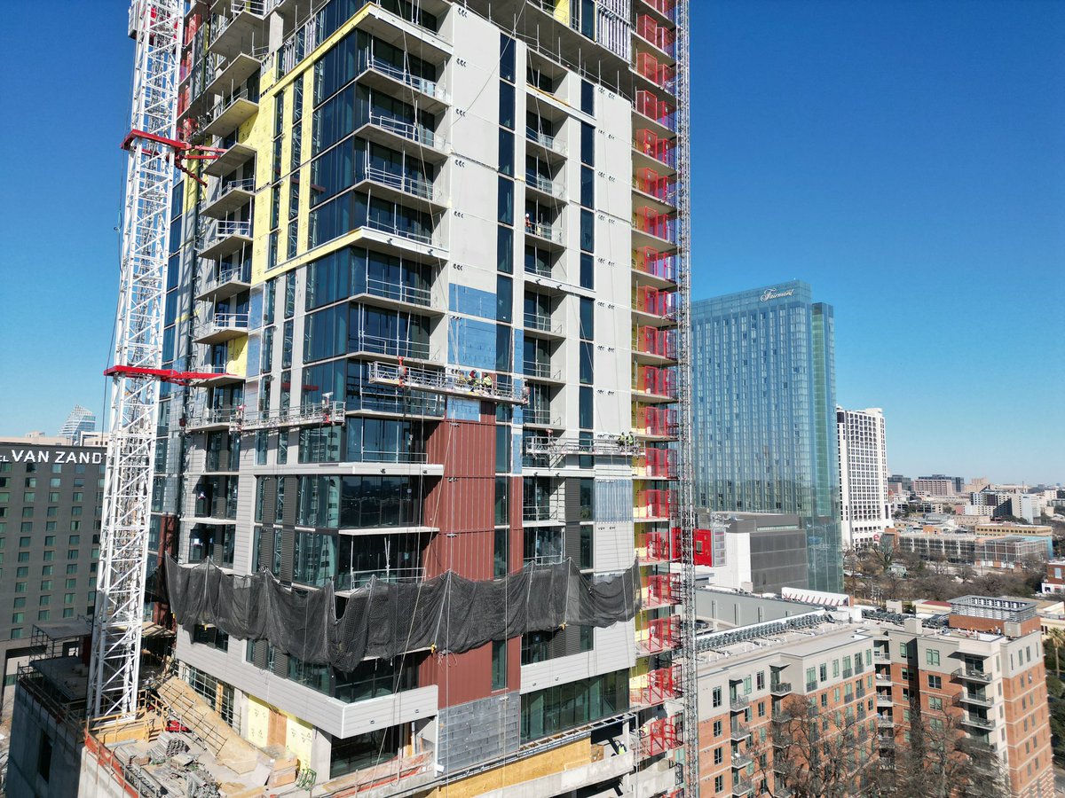 AbsoluteRoofTX's tweet photo. Rising up in Austin. Metal Wall Panel Install continuing along very nicely in this tower project. https://t.co/stp3cXgous