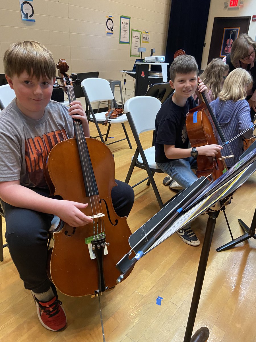 HHoelle's tweet photo. 5th grade orchestra students partnered up to support each other with tuning instruments and playing solo pieces for each other! Student-driven learning in orchestra class! Great job, Falcons! @ayerelementary @FHSchools https://t.co/V3c0M7cG4V