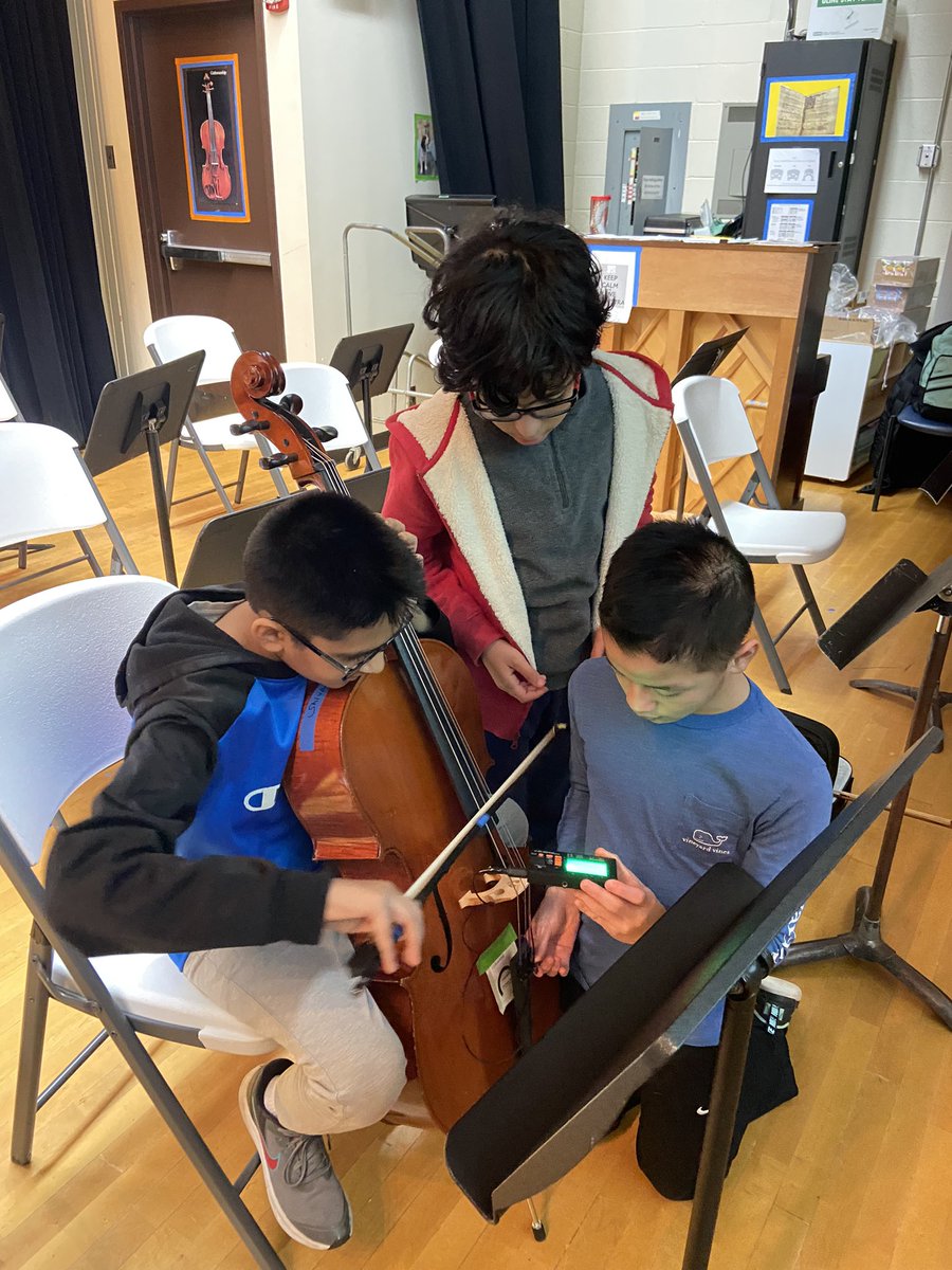 HHoelle's tweet photo. 5th grade orchestra students partnered up to support each other with tuning instruments and playing solo pieces for each other! Student-driven learning in orchestra class! Great job, Falcons! @ayerelementary @FHSchools https://t.co/V3c0M7cG4V