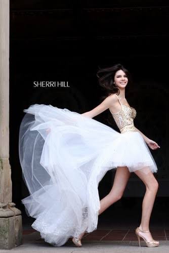 LUXEMOOD's tweet photo. @COSMICPR4DA honestly even baby kenny in this 2011 sherri hill campaign had way more personality! yes it’s less high fashion editorial but there’s life in it https://t.co/RMfJHVz8UX