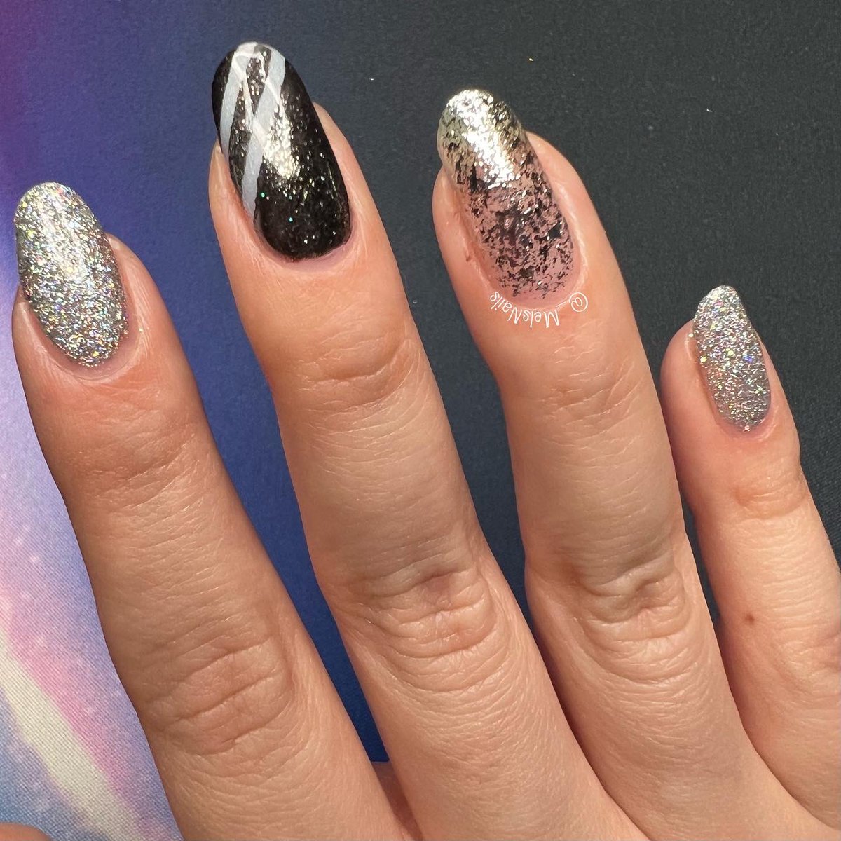 _MelsNails's tweet photo. A black and silver mani 🖤🤍💅🏻 
@nailogical @holotaco #LongLastingBase #RainbowSnow #FeaturedGuest #Smokeshow #Blacklisted #HighestBidder #SilverFlakeTaco
#HoloTaco #melsnails #PaintWithSimply #NailArt https://t.co/vQgCgMM2KK
