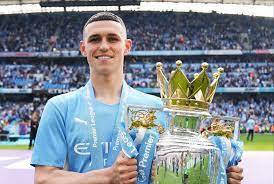 AnishDesai20's tweet photo. @ESPNUK Start the one with a Premier League trophy and a PFA young POTY https://t.co/Rr4s8JiodE