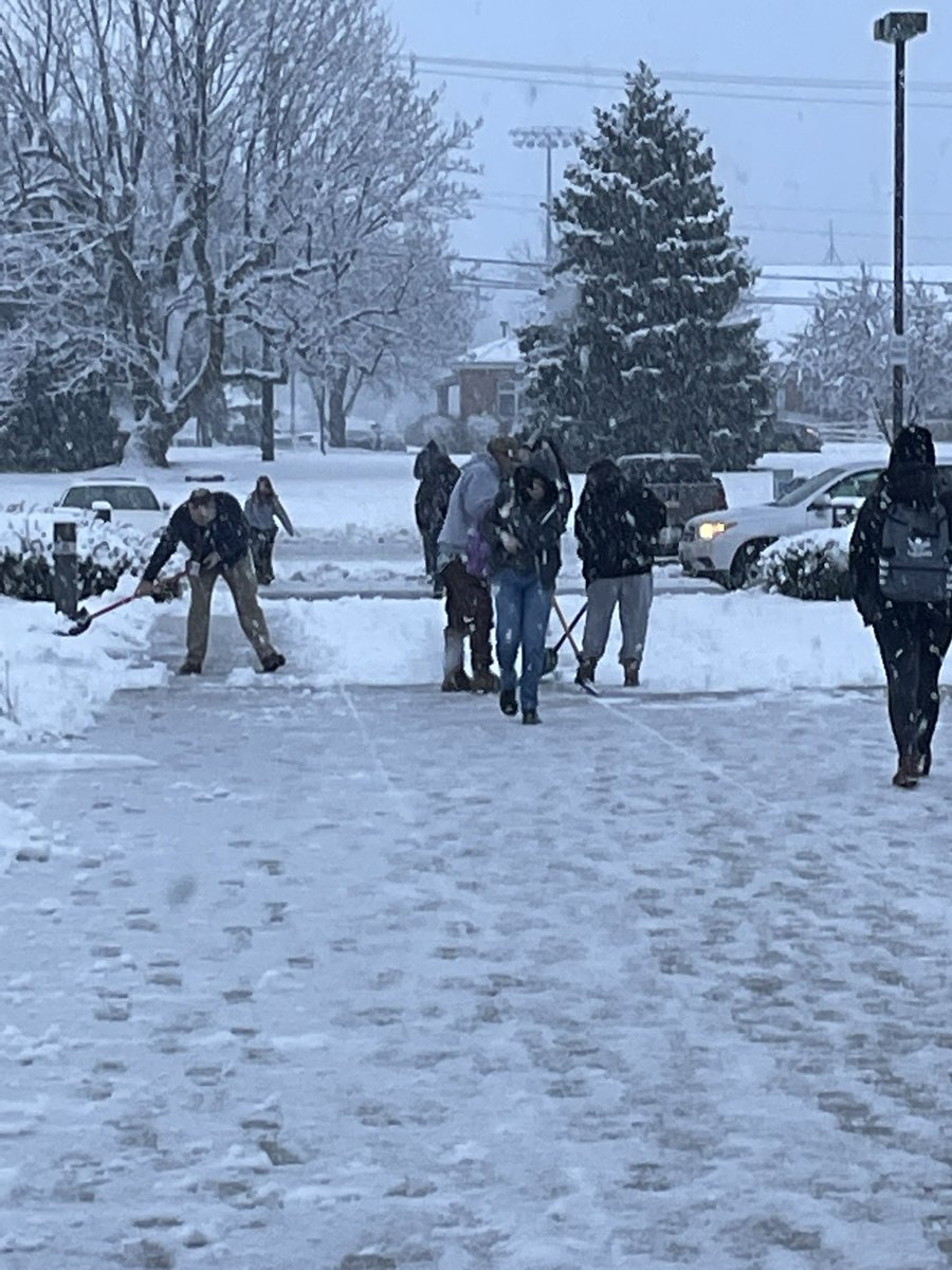 Dear_Mrs_M's tweet photo. A huge shoutout to our custodial team and Dr. Travis for hand shoveling the walkway to YHS! #teamwork https://t.co/732pdlx17e