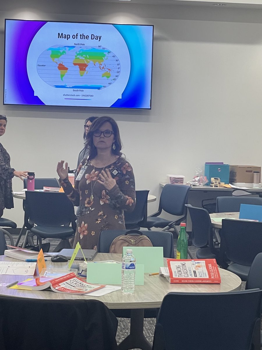 ⁦<a href="/MMStutts11/">Mandy Stutts</a>⁩ is working Ts hard at JH Math Institute. They are working with graphs and non-permanent vertical surfaces to explain thinking through “Ss hats”. Why is this important? Ts begin w/ a Ss pov to create a plan that starts where S are &amp; move Ss 4ward. #SecCI