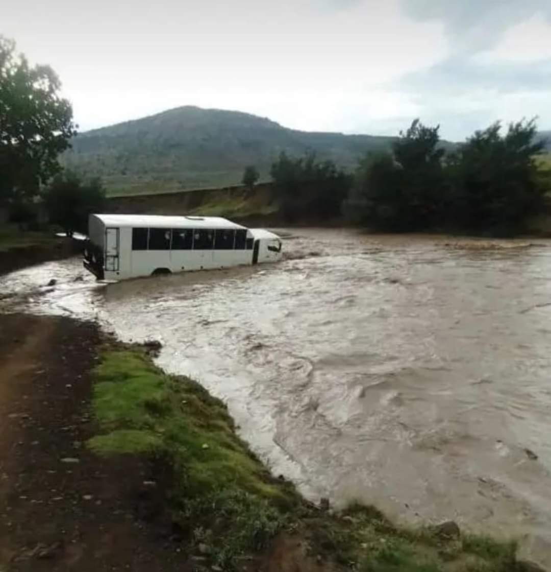 Situation in Tsoaing, Matelile, Mafeteng. A tour bus was swept away by the river. No fatalities as the tourists were on foot at the time. This is where a makeshift bridge was swept away as a result of heavy rains.