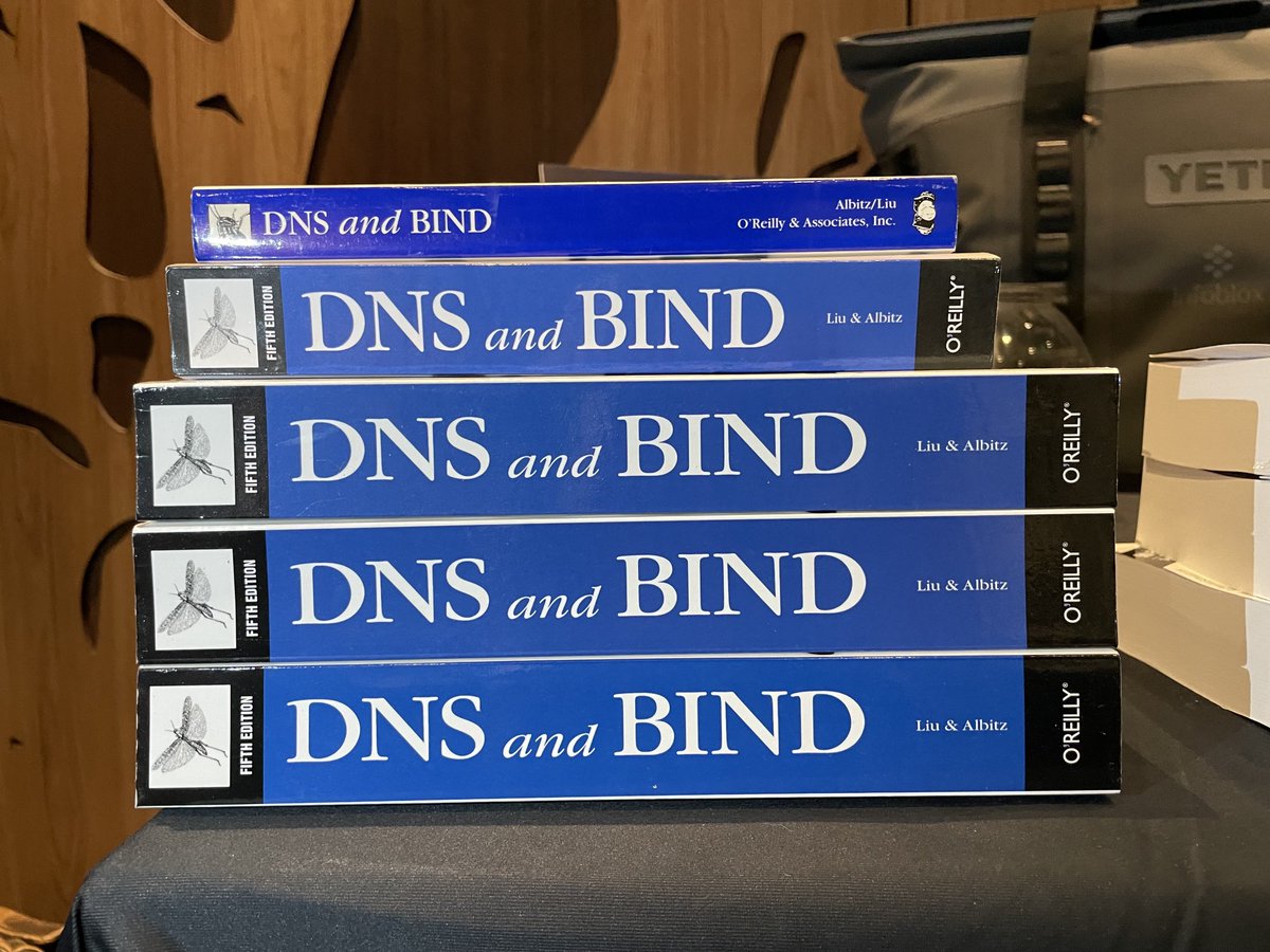 cricketondns's tweet photo. The evolution of “DNS and BIND”: the top is Matt’s first edition, immediately below it is a fifth edition, and below that are several inexplicably larger fifth editions. All to be given away at today’s ⁦@Infoblox⁩ event in MSP! https://t.co/DkCZQqpYba
