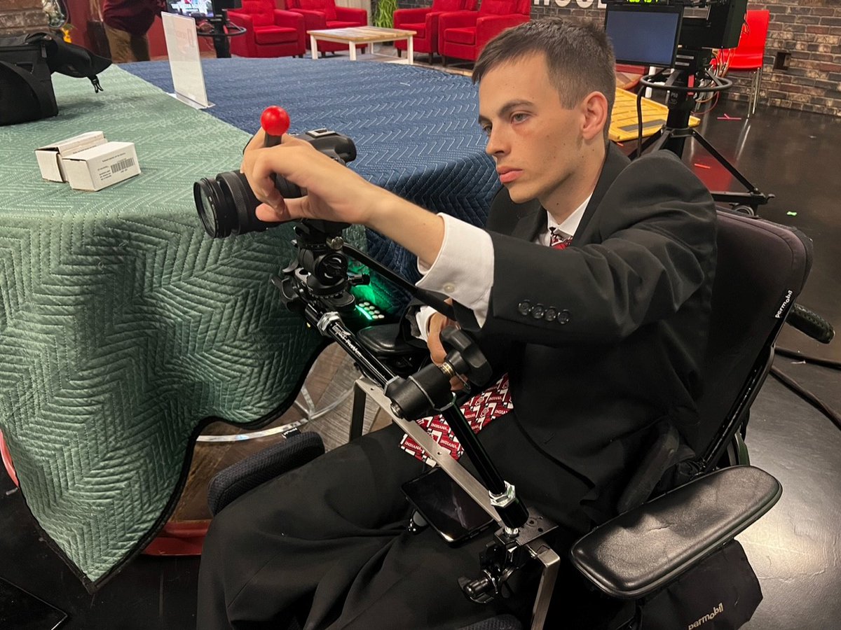 Senior Josh Fugate tests an accessibility measure in the Ken and Audrey Beckley Studio.