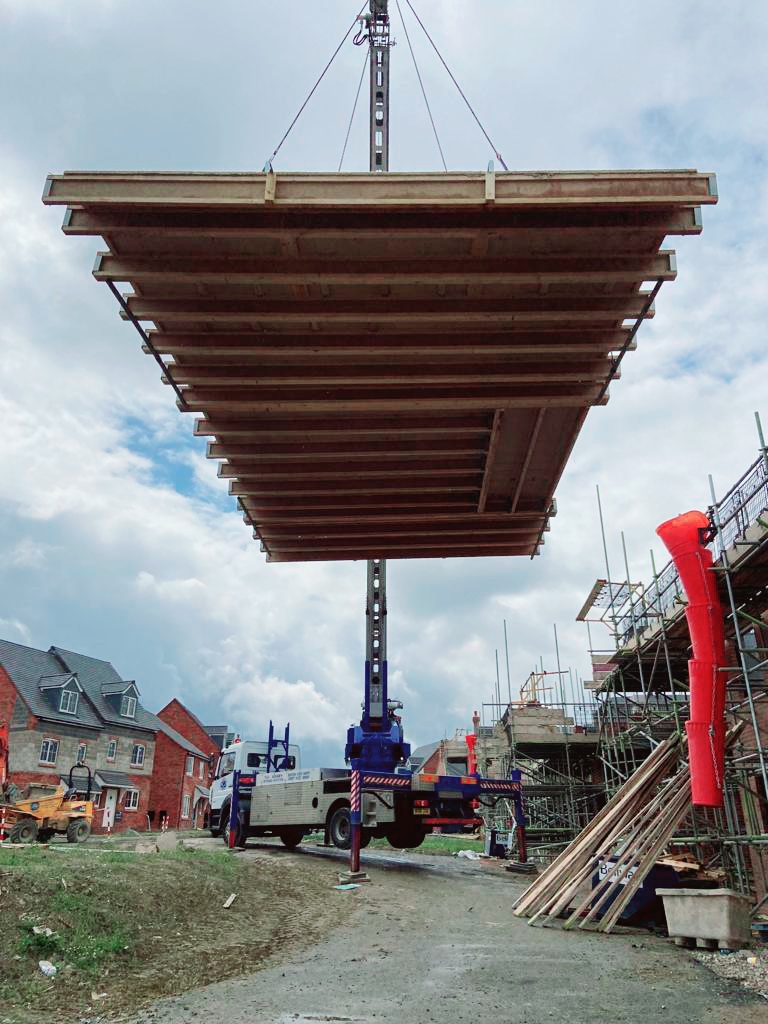 Our Klaas 900rsx is an ideal machine for lifting smart roof cassettes into position with ease #Klaas #cranehire #contractlifting #timberframe